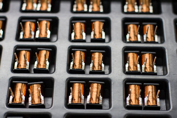 Close up on industrial coils made of copper.