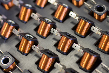 Close up on industrial coils made of copper.