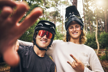 Forest, cycling and friends take a selfie in nature on an outdoor bicycle adventure in the woods in...