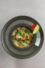 Delicious tom yum soup with seafood vietnamese soup, thai cuisine on the table