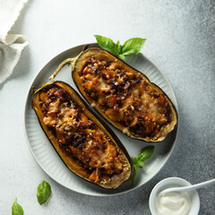Stuffed roasted eggplant with meat and cheese