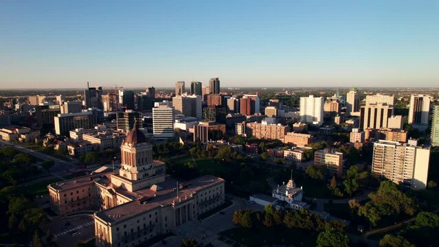 Golden Hour aerial shot of Winnipeg skyline with Legislative Building.