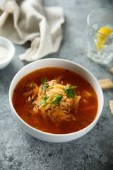 Traditional sauerkraut soup with fresh parsley