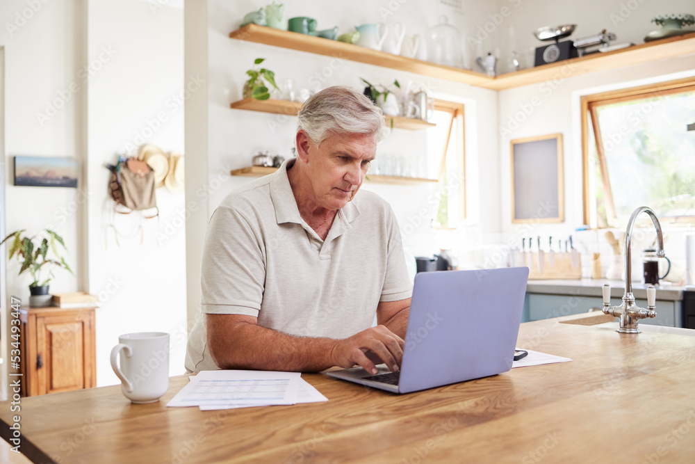 Canvas Prints Senior man, laptop and working in kitchen on retirement plan, budget and expenses at home. Elderly male typing on computer in Australia, planning finances, checking or sending email on technology