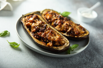 Stuffed roasted eggplant with meat and cheese
