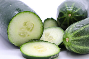 cut cucumber isolated on white background
