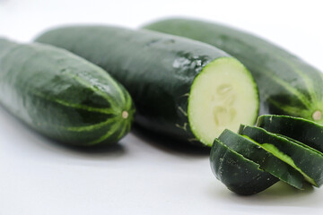 cut cucumber isolated on white background
