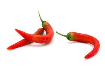 Organic red hot chili peppers isolated on white background.	