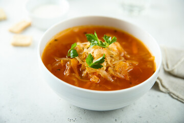 Traditional sauerkraut soup with fresh parsley