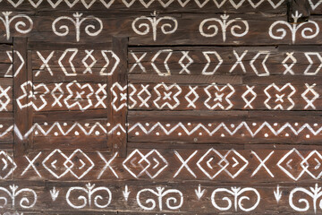 close-up view of a folklore painted house wall in the center of Cicimany in Slovakia