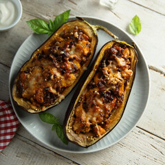 Stuffed roasted eggplant with meat and cheese