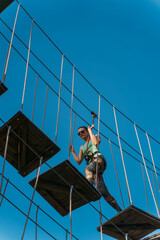 Fototapeta premium Woman in an adventure park