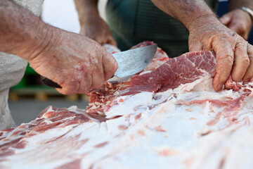 Pig slaughtering  ham production process. 