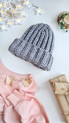 Fashionable knitted hats autumn-winter. The hat lies on a white background. Product layout. Buy a hat. Knitting. Hobby.
