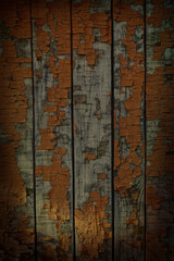 Vintage background of wooden planks with peeling old brown paint.