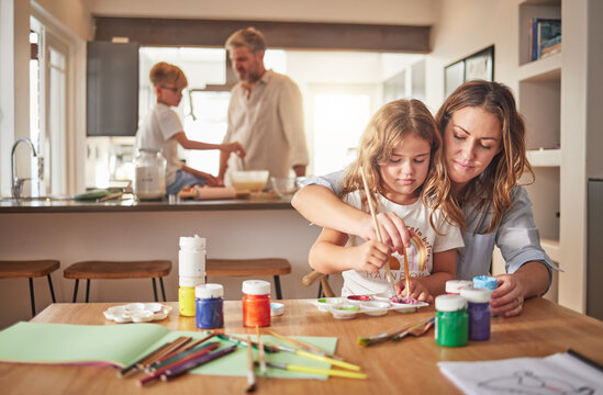 Family, art and mom with children painting, drawing or create artwork while having fun, bond and enjoy quality time together. Love, home and creative arts and crafts for kids, girl or playing child