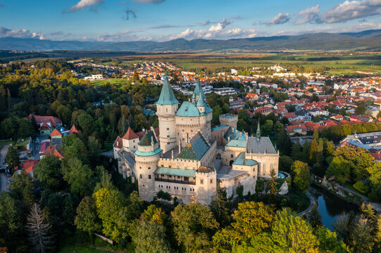 drone view of Bojnice Castle in Slovakia in warm evening light