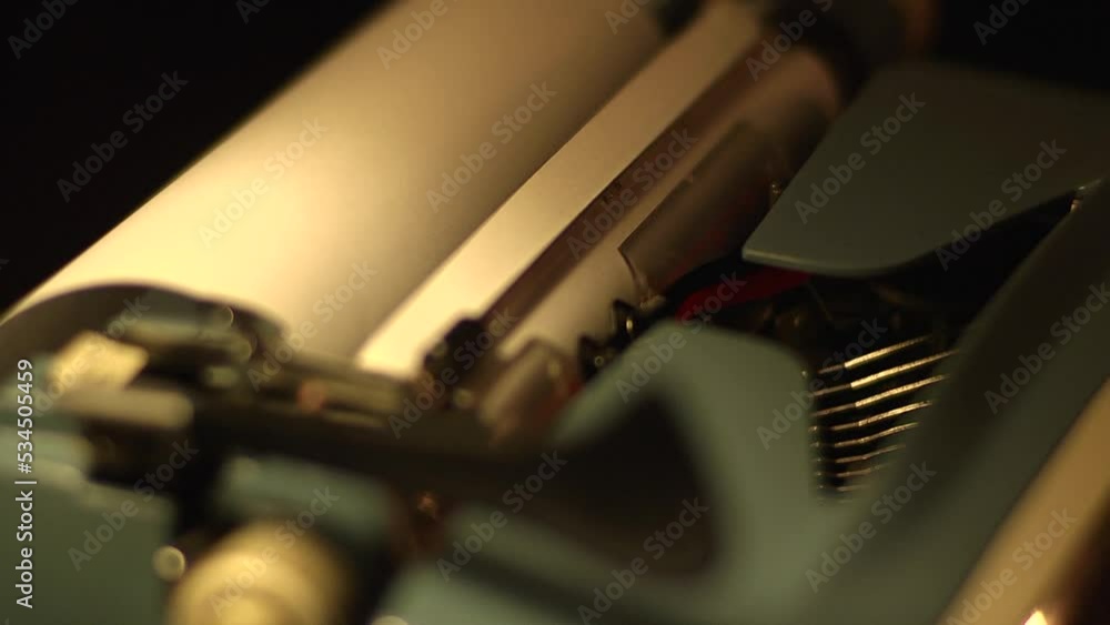 Poster closeup shot of a typewriting machine typing slowly