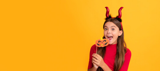 teen girl on yellow background. celebrate autumn party holiday. childhood fun. Halloween kid girl portrait, horizontal poster. Banner header with copy space.