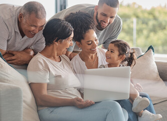 Happy, laptop and big family streaming a movie, relaxing and bonding together on the weekend at home. Child, grandparents and mother with father watching movies on online entertainment subscription