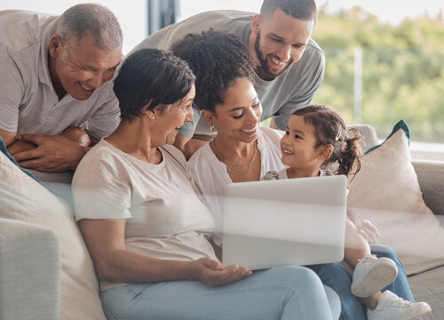 Happy, Laptop And Big Family Streaming A Movie, Relaxing And Bonding Together On The Weekend At Home. Child, Grandparents And Mother With Father Watching Movies On Online Entertainment Subscription
