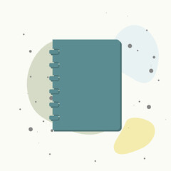 Notebook on multicolored background.