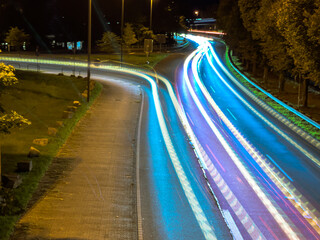Fototapeta na wymiar Light trails on night motorway