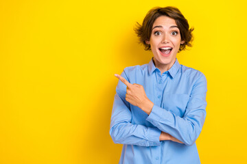 Photo of young funny bob brown hair woman wear blue shirt excited surprised open mouth finger...