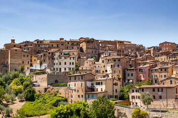 Fototapeta na wymiar Typical brown houses of Siena in Italy on a sunny day