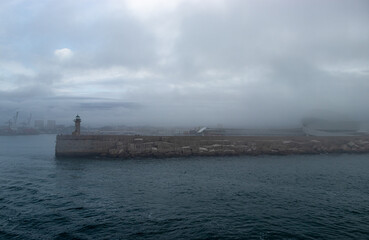 Fototapeta premium Breakwater lighthouse in the Port of Leixoes, Porto, Portugal, Europe