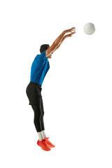 Fototapeta na wymiar Block. Studio shot of young man, volleyball player playing volleyball isolated on white studio background. Sport, gym, team sport, challenges