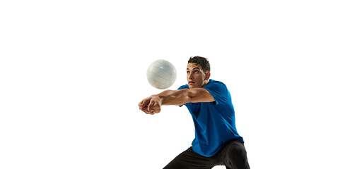 Studio shot of young man, volleyball player playing volleyball isolated on white studio background. Sport, gym, team sport, challenges © master1305