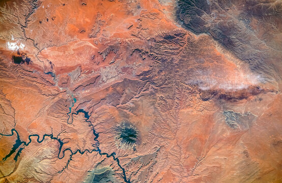 Aerial view of Lake Powell, Southeastern Utah and Northeastern Arizona, USA. San Juan River, Monument Valley, Navajo Mountain and Black Mesa seen from the top. Elements of this image furnished by NASA