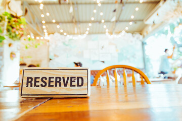 Reserved inscription label on wooden plaque