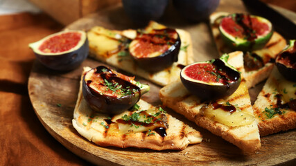 Grilled toast with figs and cheese. Healthy snack.
