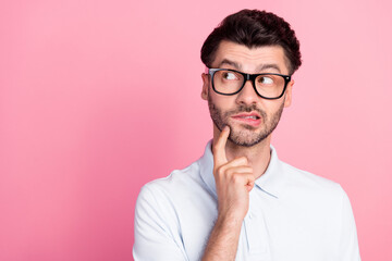 Closeup photo of young funny excited positive bearded guy wear glasses white polo pouted lips touch cheeks look empty space isolated on bright pink color background