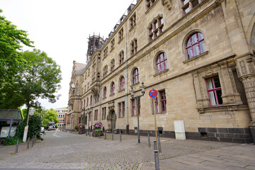 Duisburg street with the Rathaus city hall palace, Germany