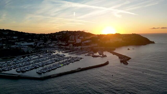 4k video as the sun rises over the resort of Torquay in Devon, UK