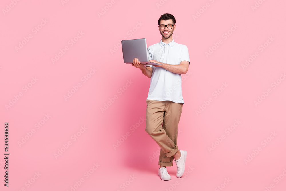 Canvas Prints Full length photo of cheerful man stylish clothes modern device gadget low price sale shop empty space isolated on pink color background