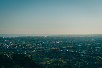 Fototapeta na wymiar A view of my hometown in Japan from the top of a mountain
