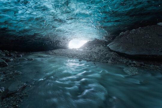 Blue ice cave in glacier