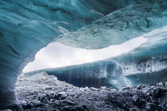Icicles melting over cold stream