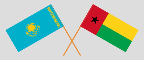 Crossed flags of Kazakhstan and Guinea-Bissau. Official colors. Correct proportion