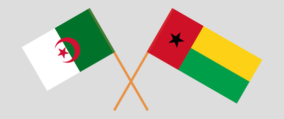 Crossed flags of Algeria and Guinea-Bissau. Official colors. Correct proportion