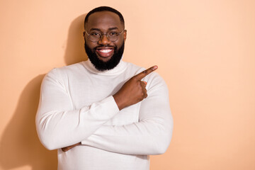 Photo of promoter guy point finger empty space shopping sale advert isolated on pastel color background