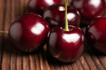 Fresh sweet cherry fruit on wooden background