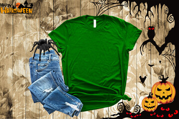 Mockup of a halloween Green T-Shirt Blank Shirt Template Photo with Fall accessories and wooden...