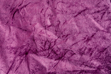 Fototapeta na wymiar Purple pink crushed velvet, shiny luxurious velveteen texture, velour bg