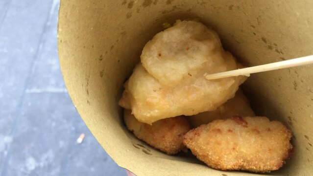 Naples street food fried dough in a cone, this is called cuoppo in Naples, Italy.