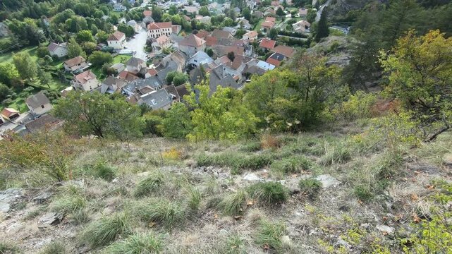 Tilt aerial and panoramic view of village La roche des Arnauds, Ceuze in the valley named Bu&euml;ch. French alps